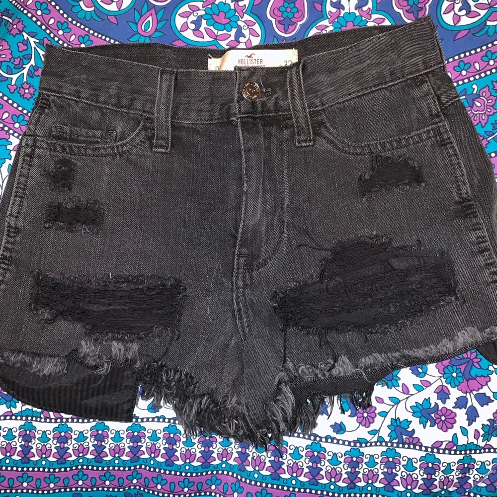 Distressed black high-waisted shorts